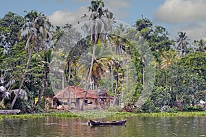 Houseboats on the backwaters of Kerala in Alappuzha Alleppey in India. A traditional tourist attraction is the house-boat on the