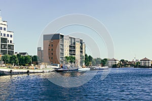 Houseboats moored in the Millwall Dock, London photo