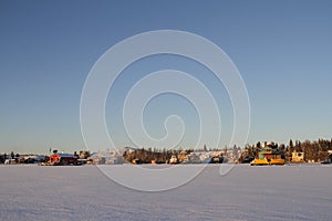 Houseboats on Yellowknife Bay in Great Slave Lake at sunset