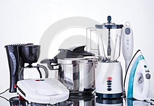 Household appliances on a neutral background