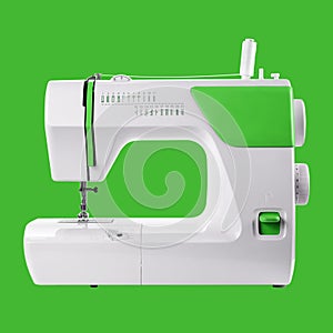 Household appliances - Sewing-machine green background