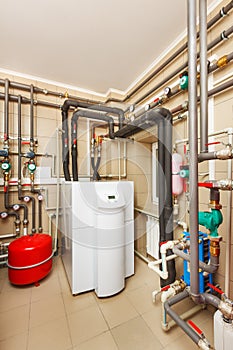 Household boiler house with heat pump, barrel; Valves; Sensors a