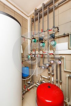 Household boiler house with heat pump, barrel; Valves; Sensors a