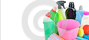 Household chemicals, sponges, napkins bucket for cleaning isolated on white . Free space for text. Wide photo