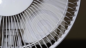 The household fan stops to rotate the blades. A moving fan to cool the you on a hot summer day