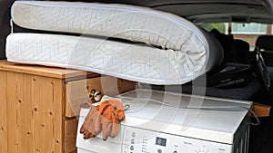 Household furniture packed into a van for recycling and clearance