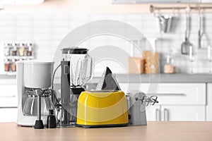 Household and kitchen appliances on table