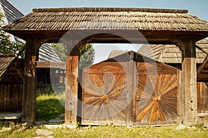 Household. Traditionally carved gate from Breb village, MaramureÃâ¢ County, Romania. photo