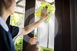 Housekeeper cleaning a hotel room