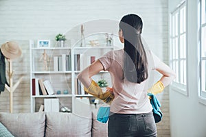 Housekeeper looking at the clean living room