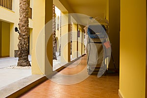 Housekeeping cart in hotel hallway