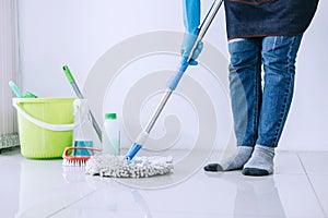 Housekeeping and cleaning concept, Happy young woman in blue rub