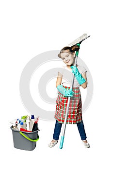 Housekeeping duties. Little girl in green rubber gloves ready for cleaning with with a mop and bucket. Mom`s assistant isolated o