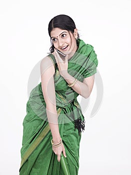 Housemaid sweeping the floor