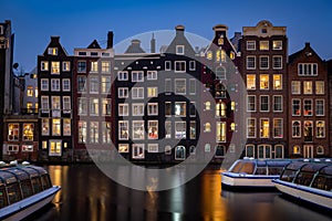 Houses along the Damrak in Amsterdam, Netherlands