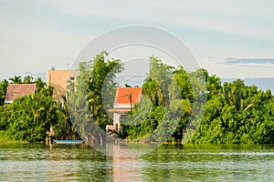 Houses along the Thu Bon river near Hoi An