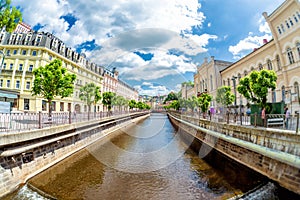 Houses along Vridelni riverside street. Karlovy Vary spa town. C