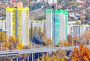 Houses on the background of the city in autumn