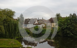 Houses on the banks of River La Cere Bretenoux France photo