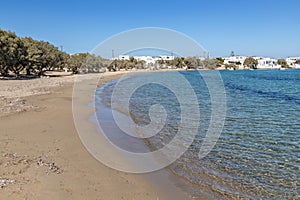 Houses, beach and trees in Pollonia beach photo