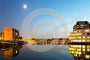 Houses and buildings on Saint Katherine Docks at night time