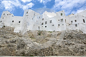 Houses built over coast rocks. Tetouan, Morocco