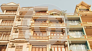 Houses built on the street where are placed back to back hostels and hotels. Air conditioners in the windows. Ha Long photo