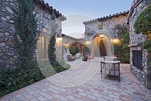 Houses With Chairs In Courtyard