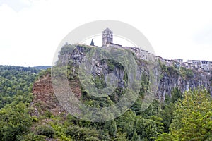 Houses and church in the high of a rock, Castellfullit de la roca photo