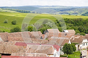 Houses of Cincsor village and the landscape on background