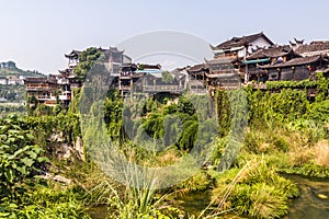 Houses on cliffs in Furong Zhen town, Hunan province, Chi