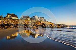 Houses on cliffs overlooking the Atlantic Ocean in York, Maine.