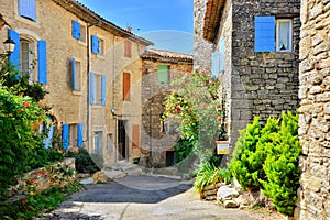 Houses with colorful shuttered windows in Provence, France photo