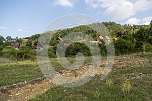 Houses damaged by ground erosion on Tara mountain