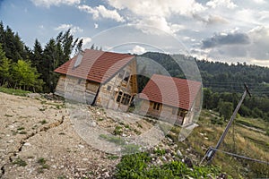 Houses damaged by ground erosion on Tara mountain