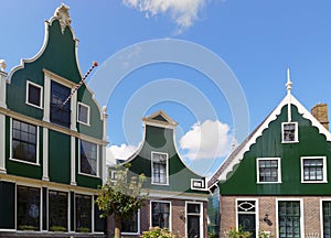Houses faÃ§ades of Zaanse Schans in the Windmillpark in Zaandem, Holland, the Netherlands.