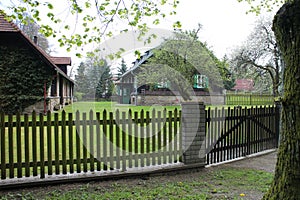 Houses with fence in LandÅ¡tejn near JindÅ™ichuv Hradec, South Bohemia