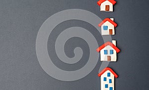 Houses figurines in a row. Find most suitable housing options.