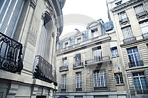 Houses on french streets of Paris. citylife concept, black balcony lace