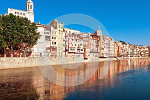 Houses of Girona reflecting in Onyar River photo