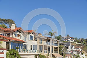 Houses with glass railings on decks at San Clemente, California