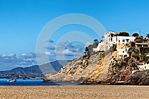 Houses on headland over the sea