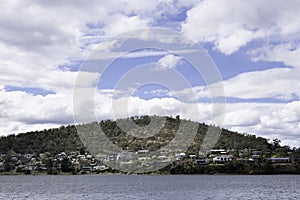Houses in Hobart, Tasmania on a hill on the banks of the River Derwent