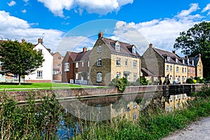 Houses on Home Orchard, built in 2004, lining the Stroudwater Navigation, at Ebley, Stroud, Gloucestershire