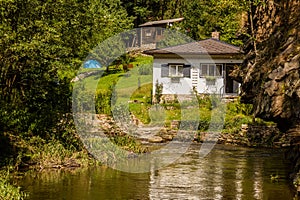 Houses in Kremzsky potok river valley, Czech Republ