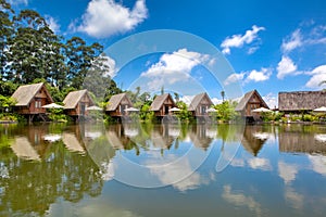 Houses in lake with blue sky in daylight HDR