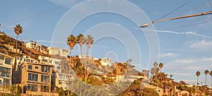 Houses in Malibu under a clear sky at sunset