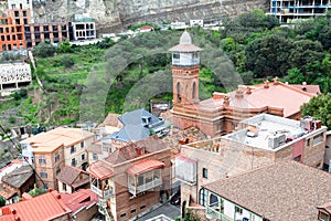 houses and minaret of Jumah mosque in Tbilisi