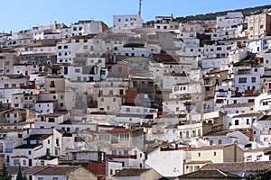 Houses on the mountainside white photo