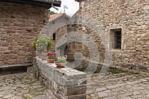 Houses and narrow streets in a mountain village in the north of Spain. Barcena Mayor